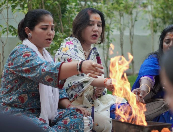 Students practising yoga at Veda Yoga Ashram